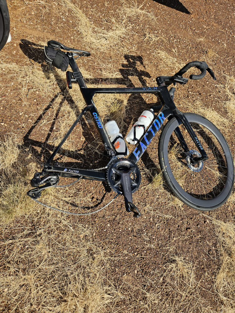 Bike minus a wheel Tom’s bike waiting patiently beside the Great Northern Highway while the punctured tyre was repaired. Bike minus a wheel Tom’s bike waiting patiently beside the Great Northern Highway while the punctured tyre was repaired.