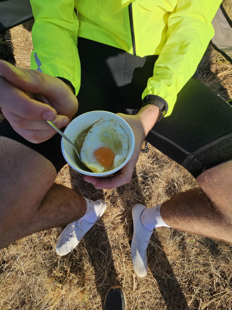 Roadside ramen Two-minute noodles topped with a fried egg being eaten during a roadside stop