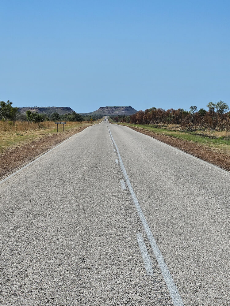 The Kimberley landscape changes Great Northern Highway stretching towards rocky formations in the Kimberley