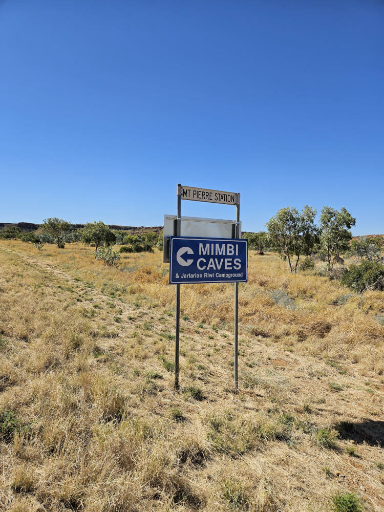Mimbi Caves, Mt Pierre Station Mimbi Caves directional sign beside Mt Pierre Station Road
