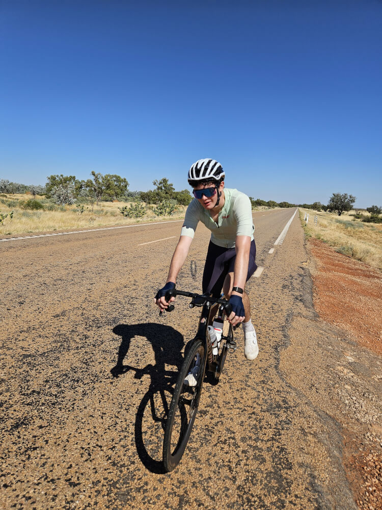 Tom Reaches Mimbi Tom Malcolm cycling towards the Mimbi Caves turnoff