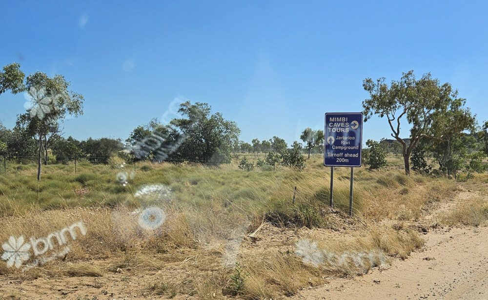 Follow the Signs Roadside sign directing visitors towards Mimbi Caves campground