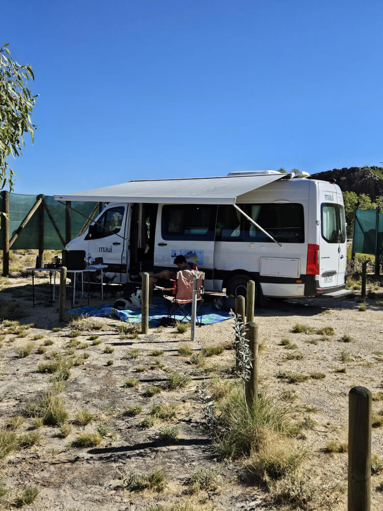 Camp at Mimbi Support campervan with awning set up at Mimbi Caves campground