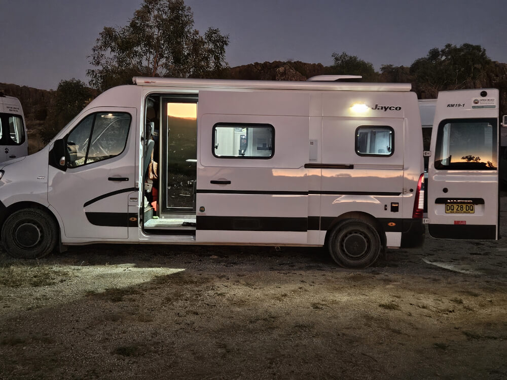 Mimbi Caves Before Sunrise Support van at Mimbi Caves campground in the early morning darkness