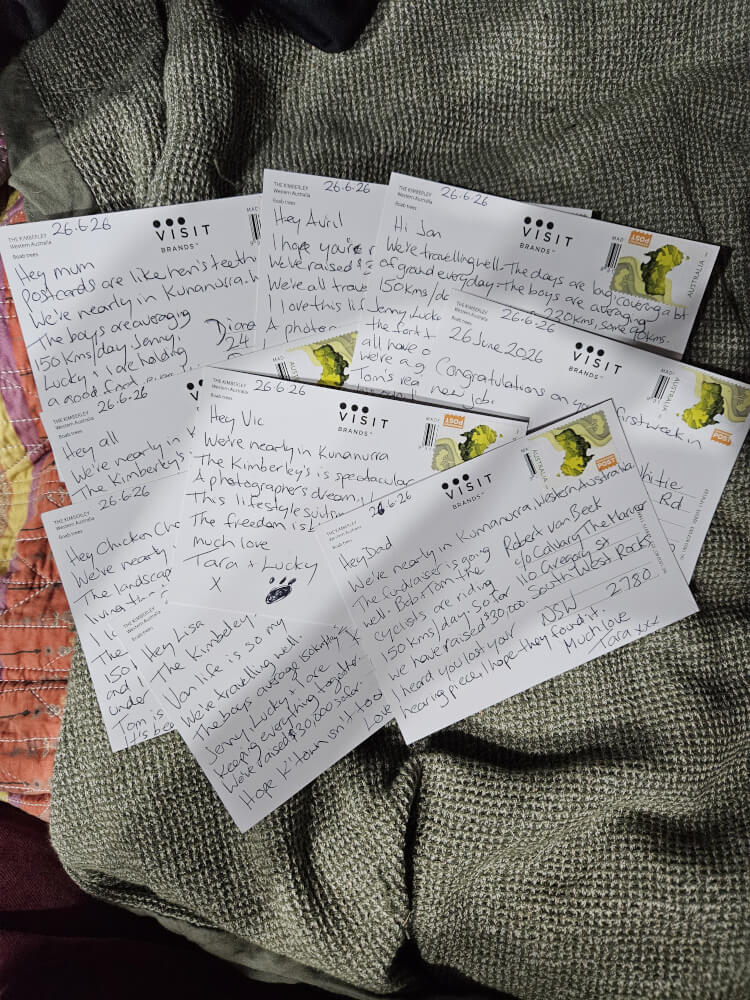 Handwritten postcards and stamps during the Broome to Bowral journey