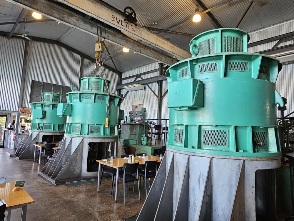 Original Pumps at The Pumphouse Kununurra Large turquoise pumps inside The Pumphouse in Kununurra