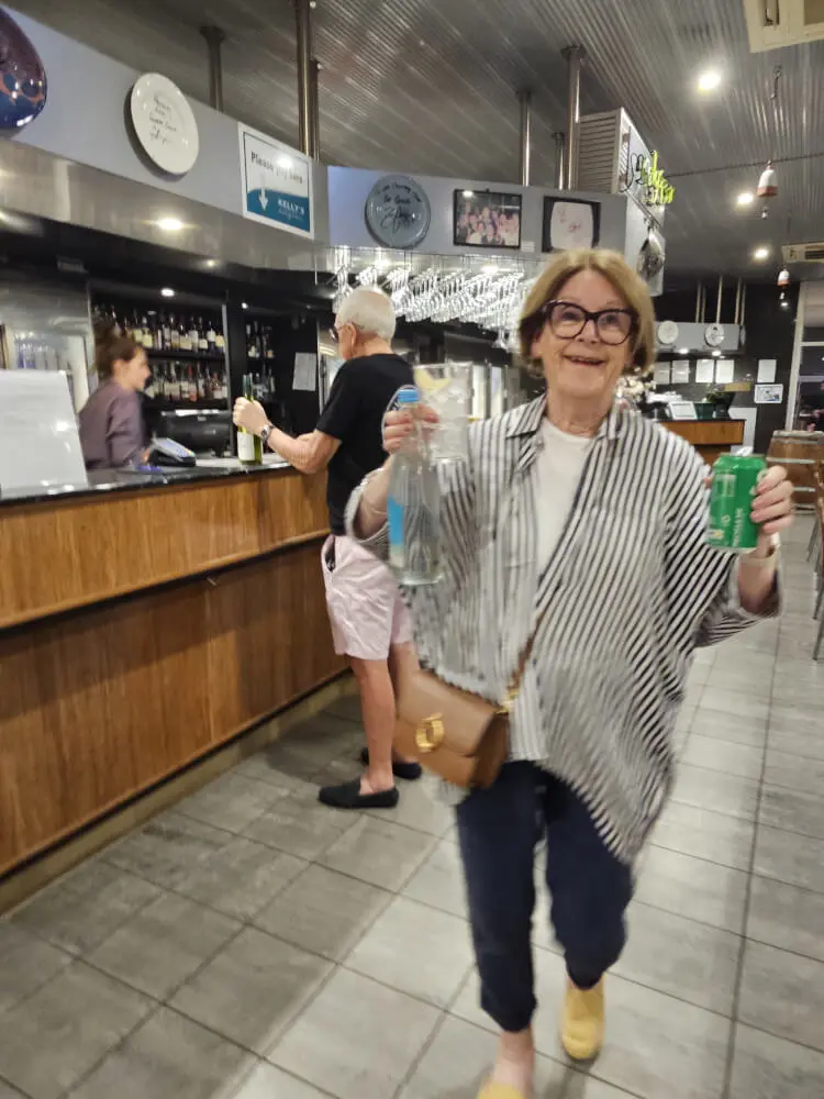 Jenny Enjoying Civilisation Jenny smiling inside Kelly's Bar & Grill in Kununurra