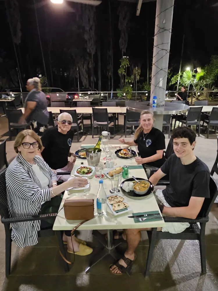 Jenny, Bob, Tara and Tom sitting together at dinner in Kununurra