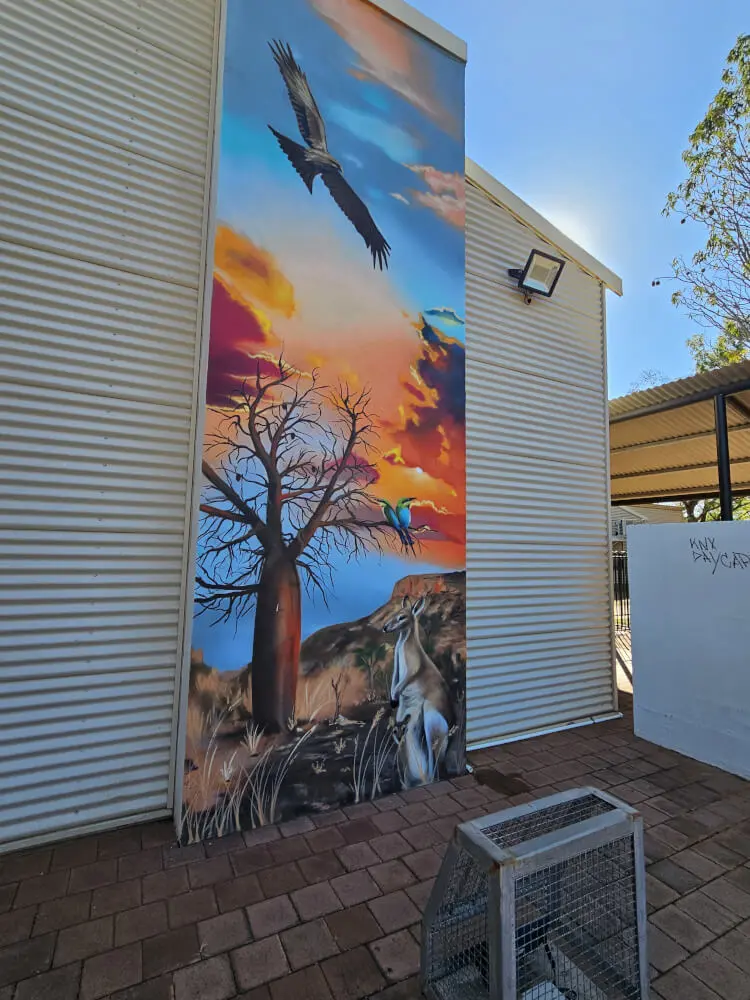 Kununurra Mural Large colourful mural painted on the side of a building in Kununurra