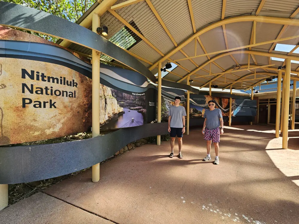 Bob and Tom at Nitmiluk National Park Bob and Tom standing beside the Nitmiluk National Park information displays under a covered walkway
