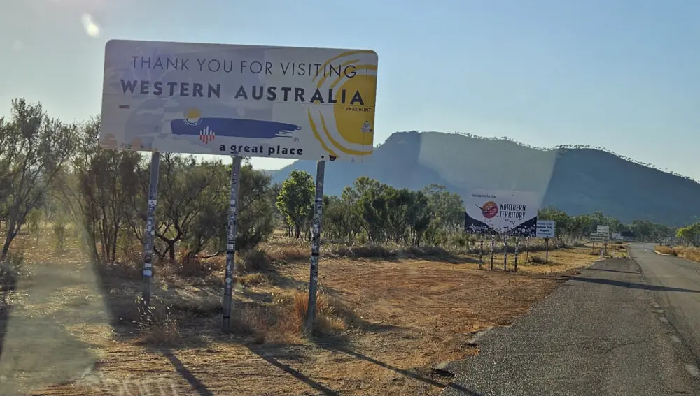 Welcome to the Northern Territory sign beside the Victoria Highway